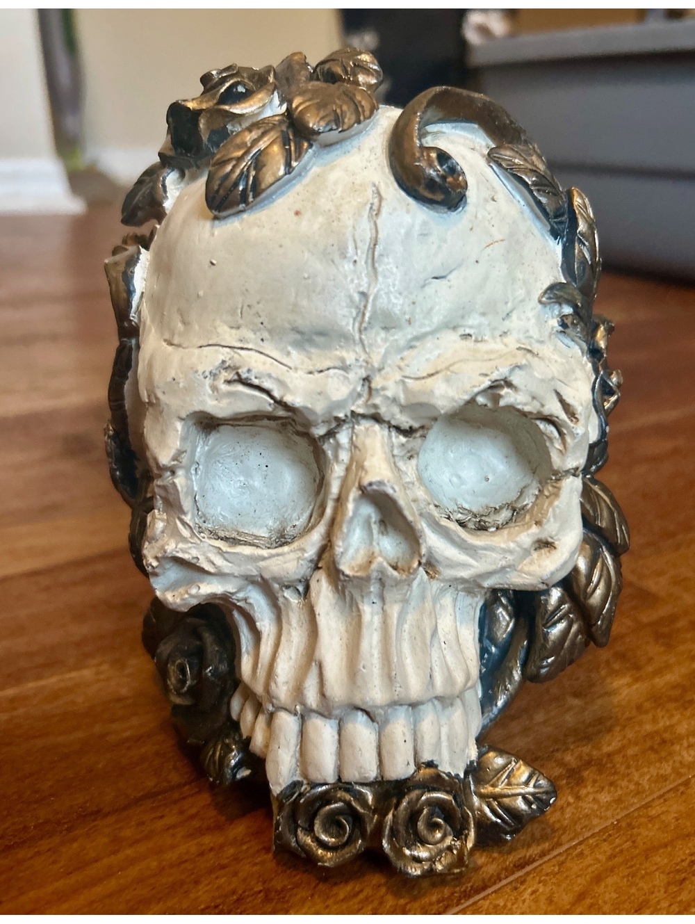 Decorative Skull Figurine with Bronze Rose and Leaf Accents